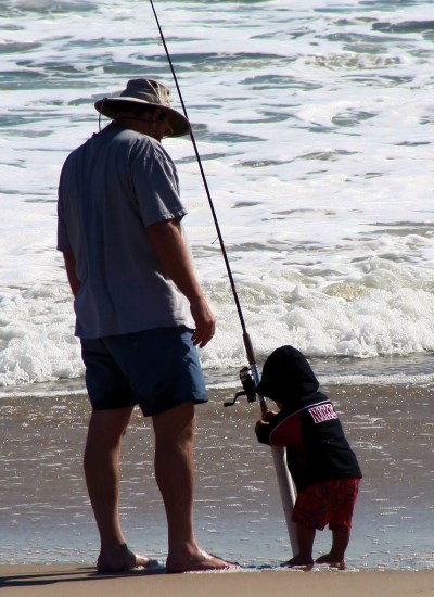 father fishing